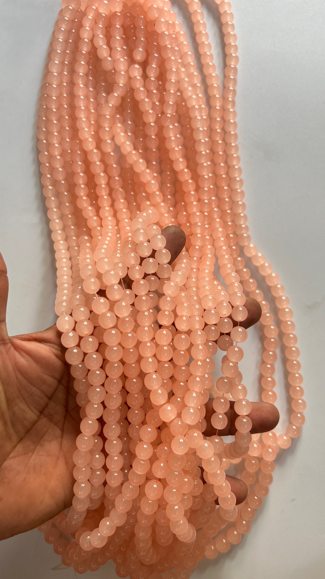 5 line peach colour 8 mm glass beads