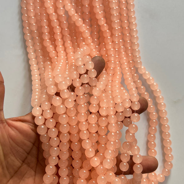 5 line peach colour 8 mm glass beads